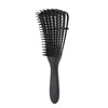 The Curl Detangling Brush