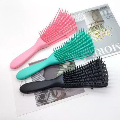 The Curl Detangling Brush